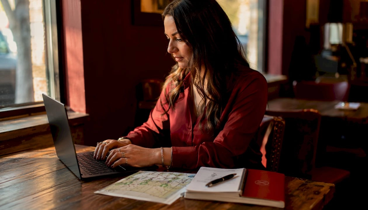 Hands typing to claim dispensary directories online